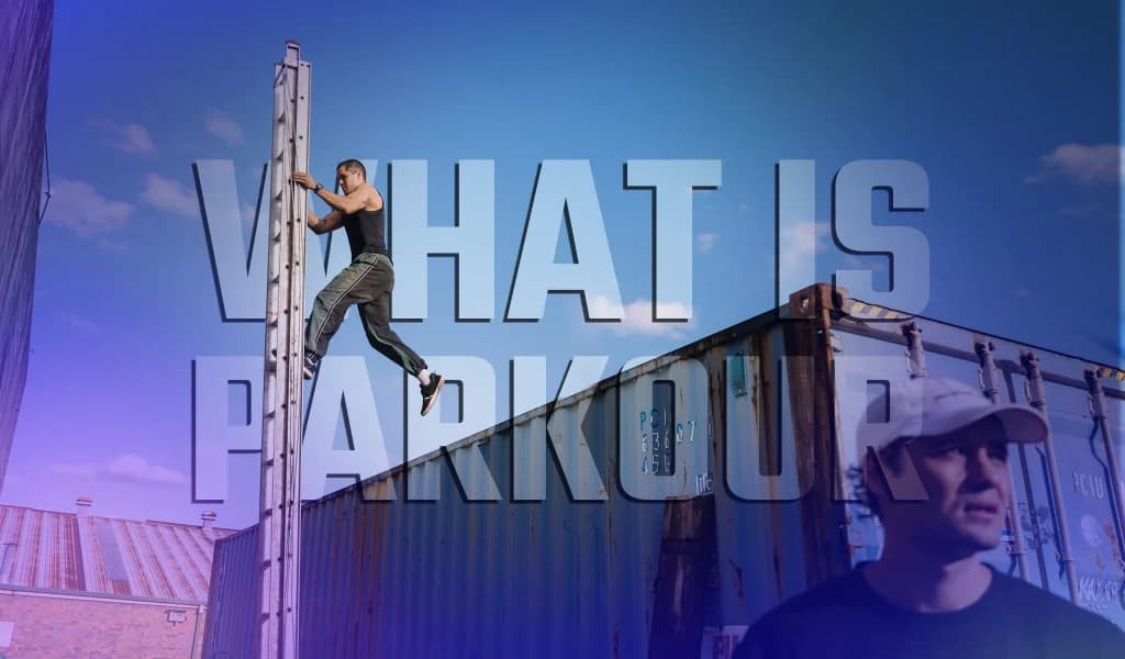 Parkour athlete climbing a ladder beside a container in an industrial setting.